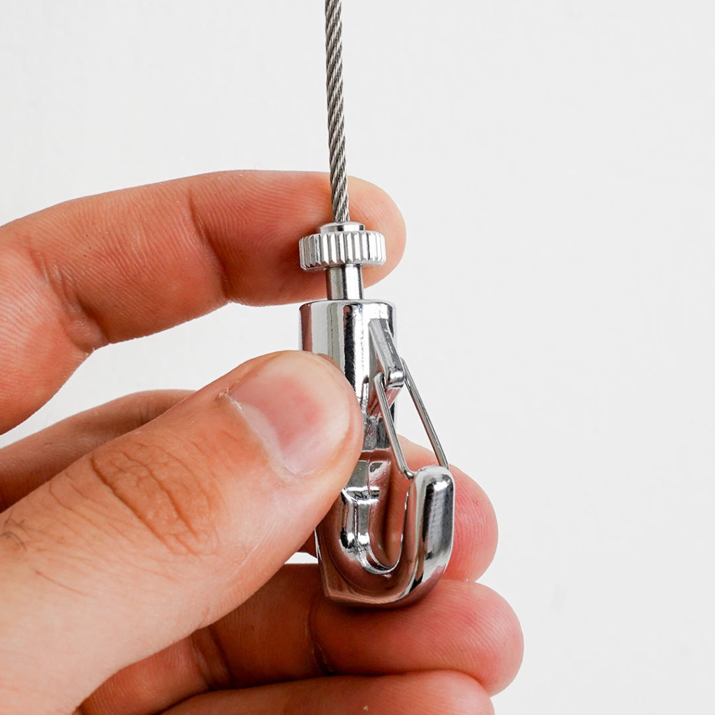 chiusura gancio appendi quadri